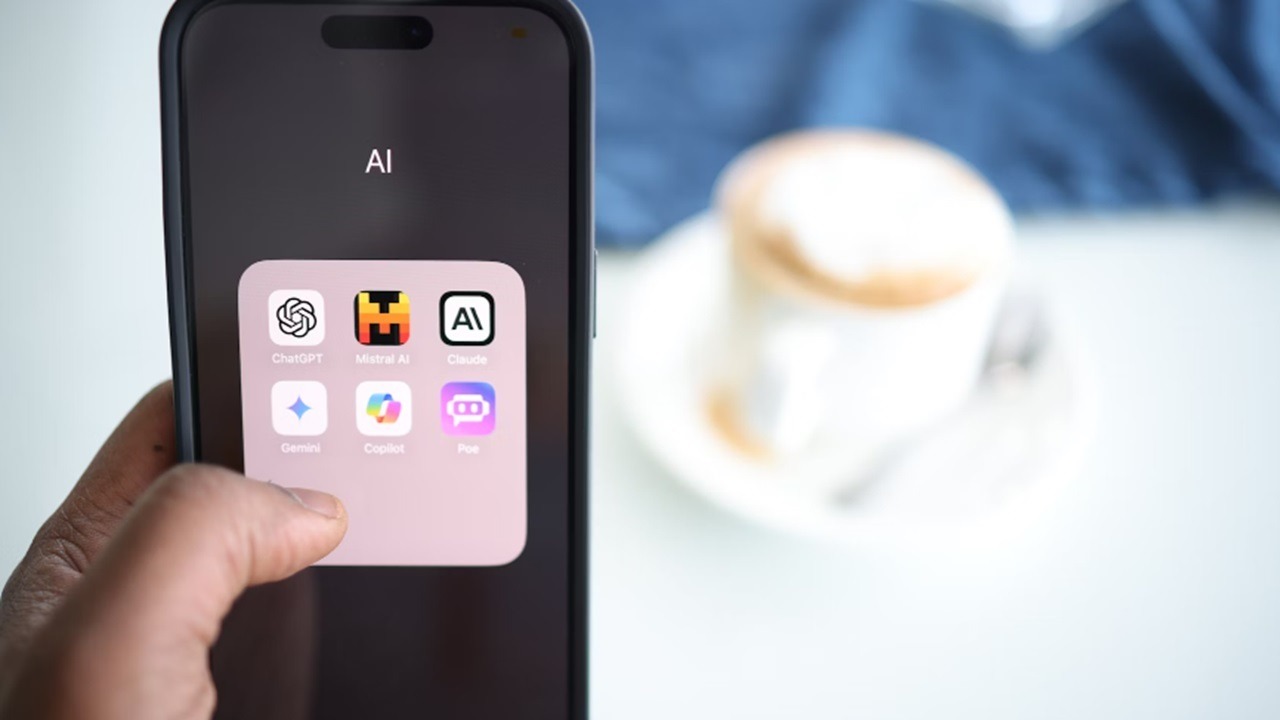 Person holding a phone with AI tools.